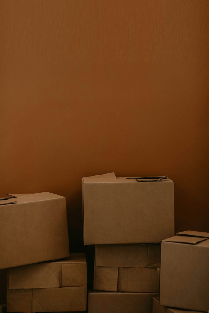 A stack of brown cardboard shipping boxes